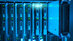 Close-up of blue-lit server hardware in a data center rack